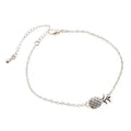 Gold or silver alloy bracelet with a detailed pineapple charm on a simple chain.
