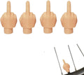 Four latex car tyre valve dust caps, shown in black and skin colour, arranged on a surface.
