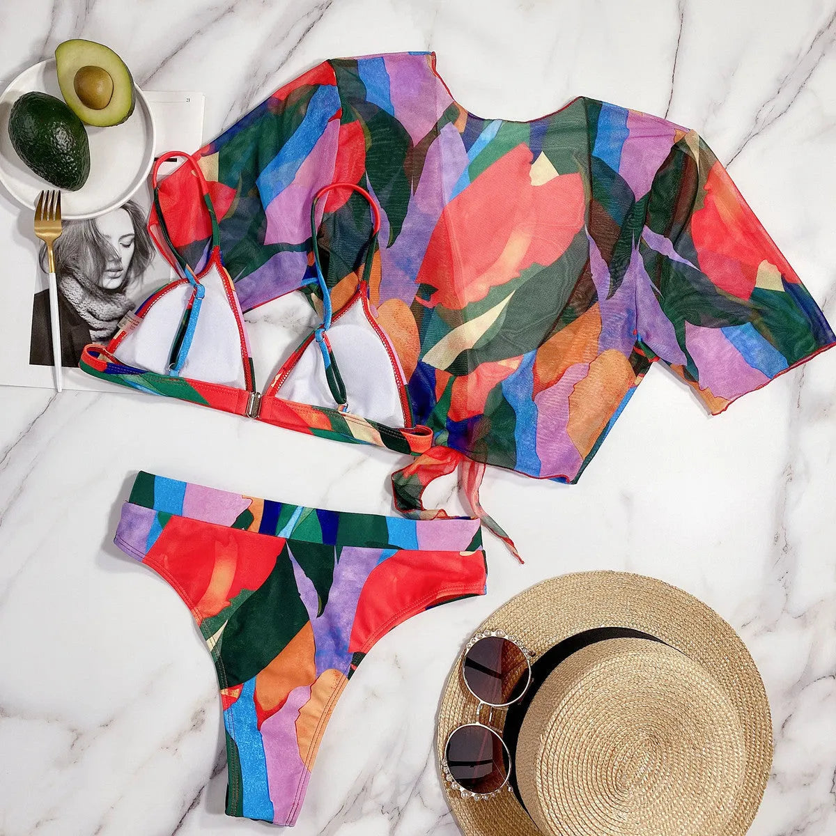 Red printed nylon split swimsuit for women, shown in a briefs-style bikini cut.