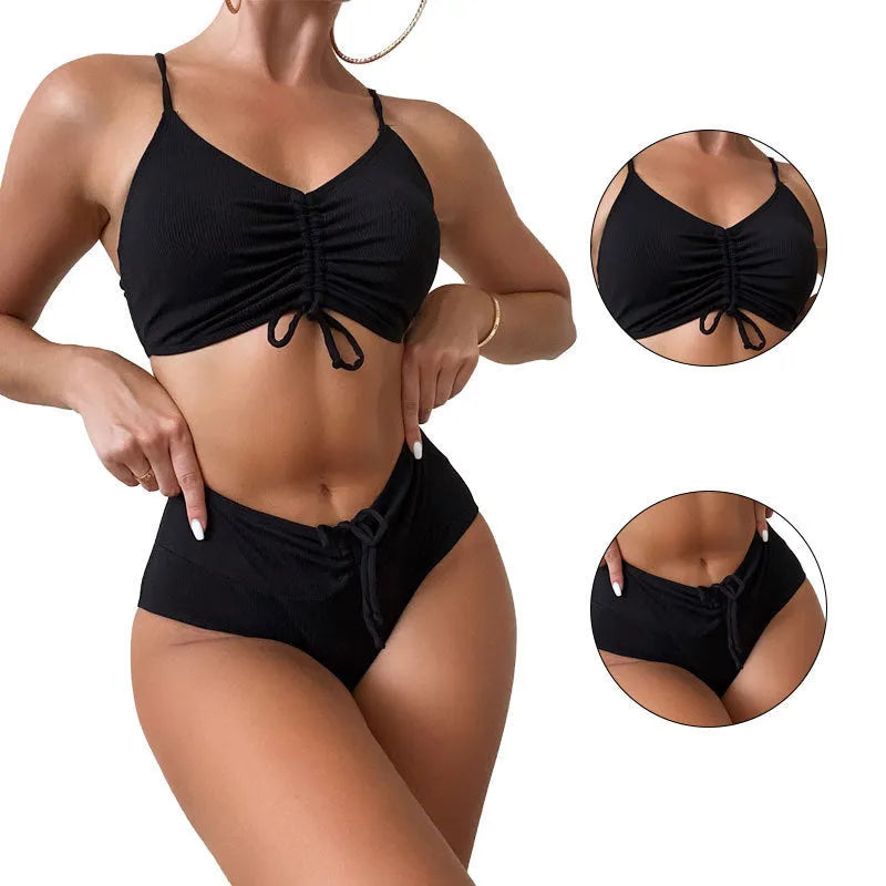 Black women's bikini swimsuit with sling split style and high waist shorts.