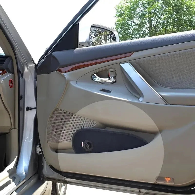 Black adjustable car window shade with suction cups mounted on vehicle side window