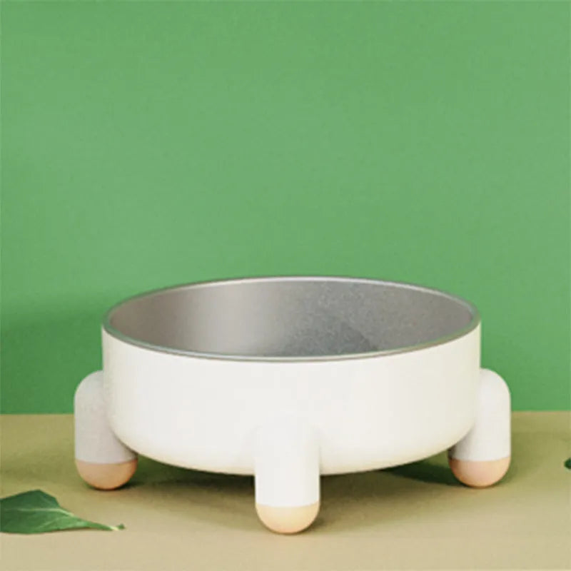 Stainless steel pet bowl with non-slip base in green, pink, and white colour options.