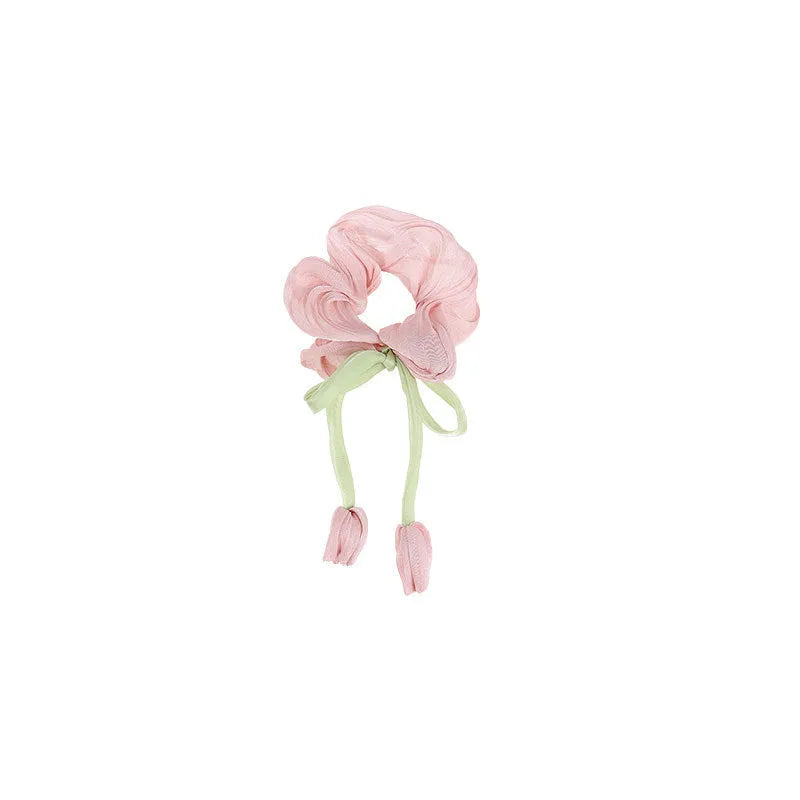 Children's knitted fabric headband with tulip element in Korean style, shown in beige, pink or purple colour option