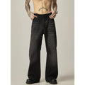Black loose straight jeans with retro styling and zipper fly on mannequin