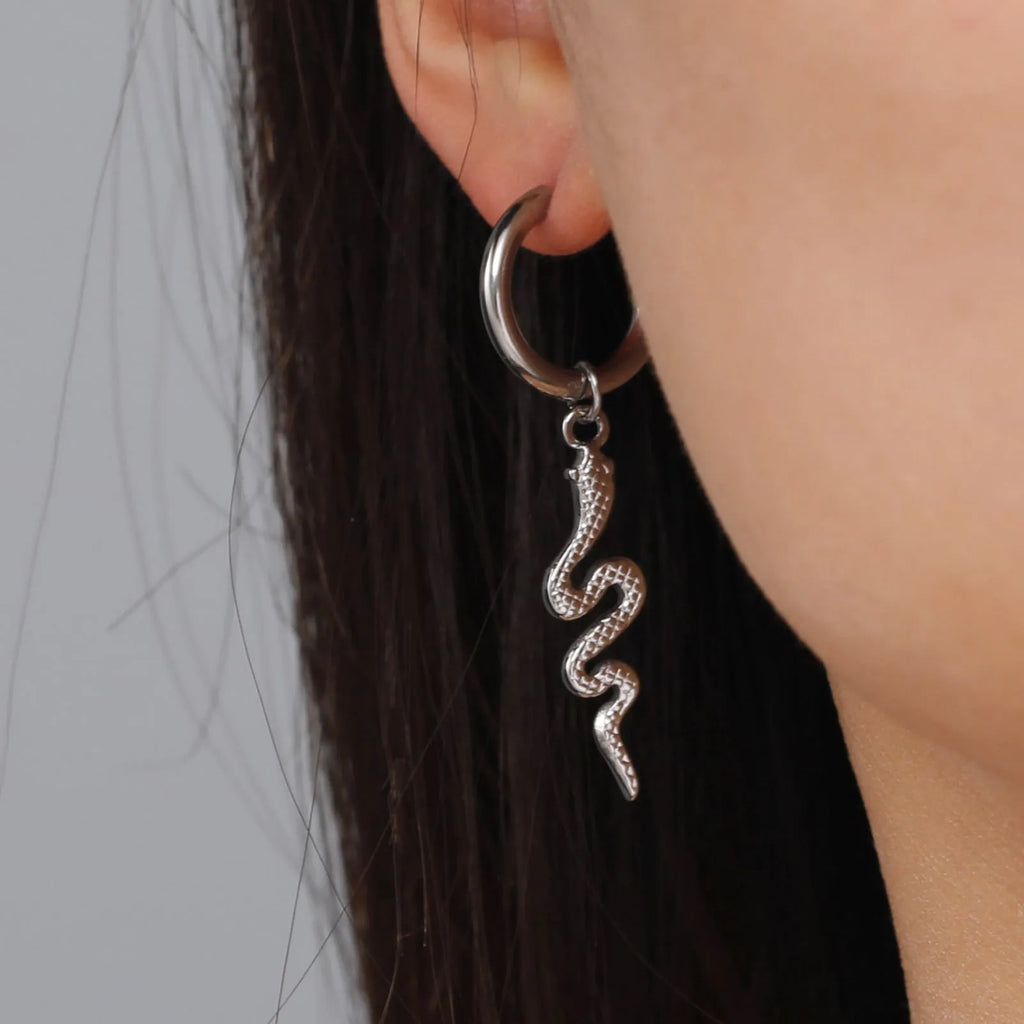 Gold snake clip-on earrings in vintage animal zodiac design