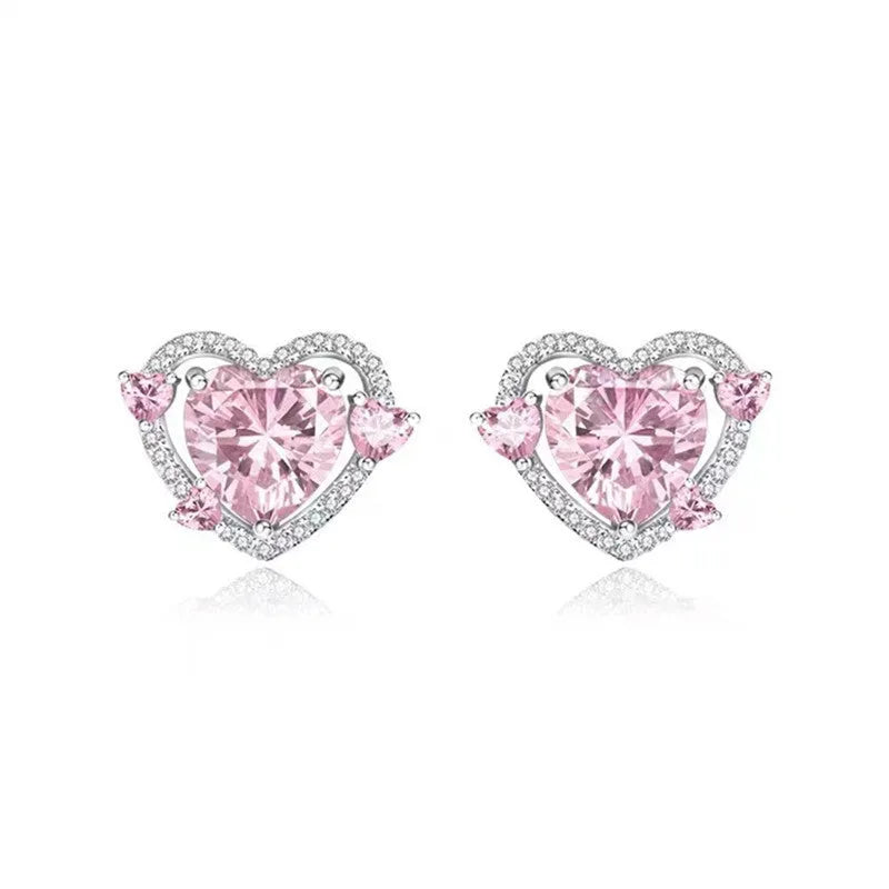 Guardian Heart white K stud earrings with heart shape design and butterfly backs.