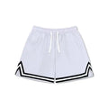 Men's loose-fit polyester sports shorts in various colours on a size chart background