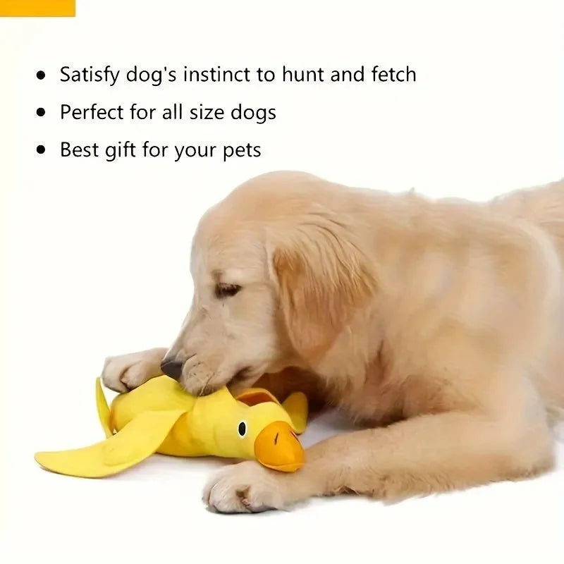 Yellow teddy duck dog toy with food leak openings and squeaker for training and chewing