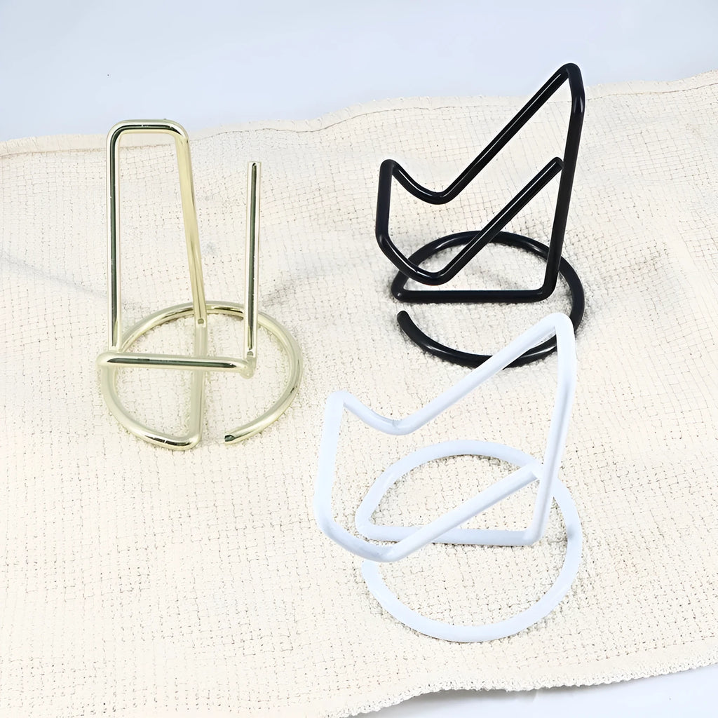 Wrought iron desktop mobile phone bracket in black, white, or gold with simple, checkered, grid, or squares support