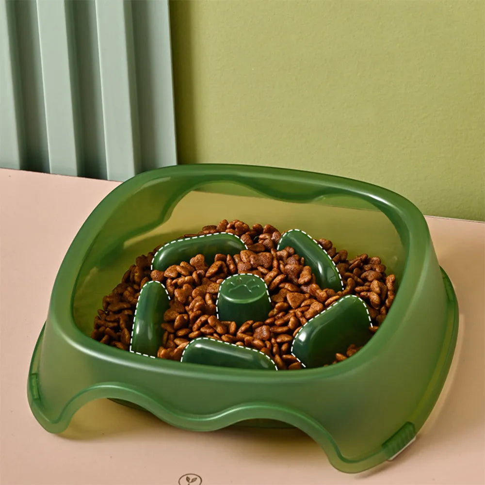 Blue plastic slow feeder dog bowl with raised obstacles for anti-choking design