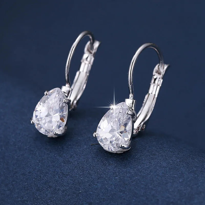 Women's drop-shaped copper earrings with metal inlays in gold and platinum colour options