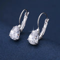 Women's drop-shaped copper earrings with metal inlays in gold and platinum colour options