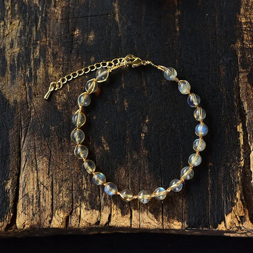 14K gilded natural crystal blue moonstone bracelet with 6mm stones and metal detailing