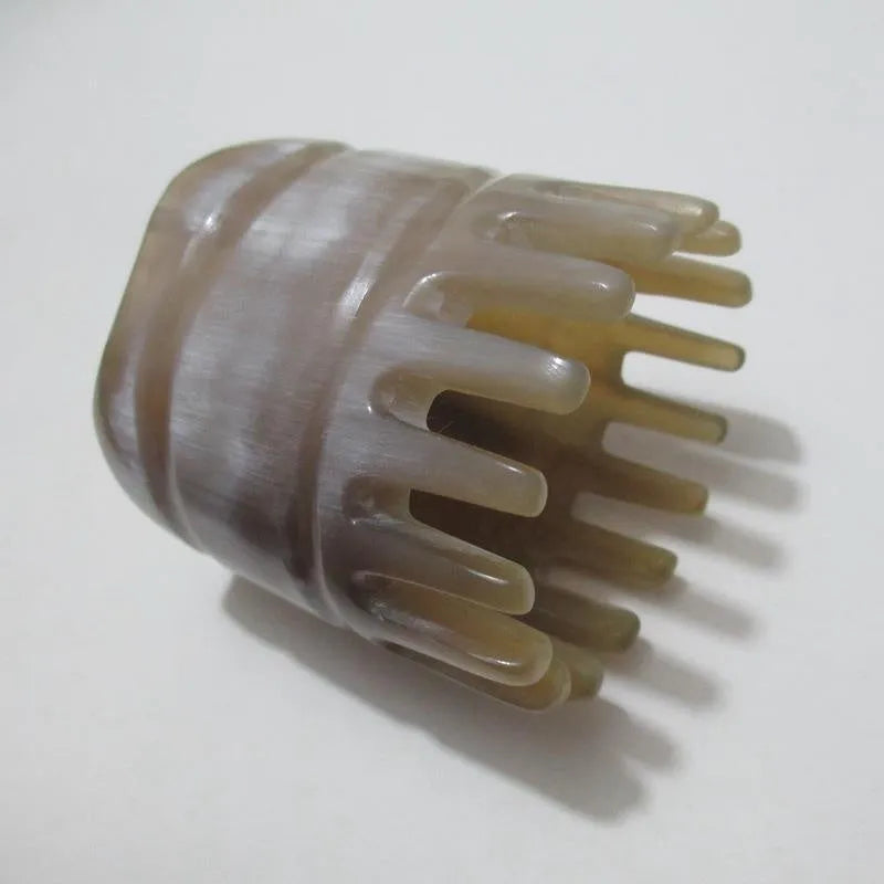 White buffalo horn comb with half-wide teeth and pointed tips for traditional Chinese meridian scalp massage