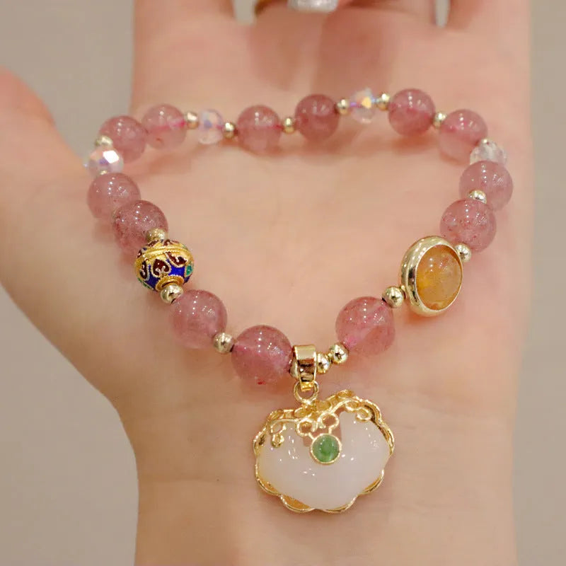 Geometric women's bracelet with grey jade and strawberry quartz stones and metal accents