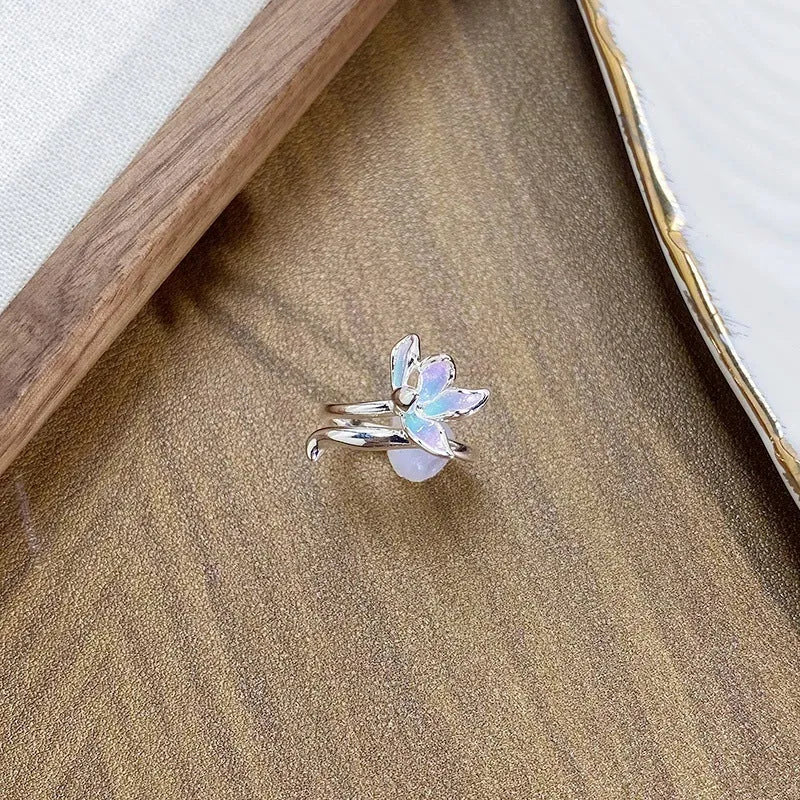 Adjustable copper insect ring with dripping oil colour finish in an irregular design.