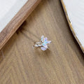 Adjustable copper insect ring with dripping oil colour finish in an irregular design.