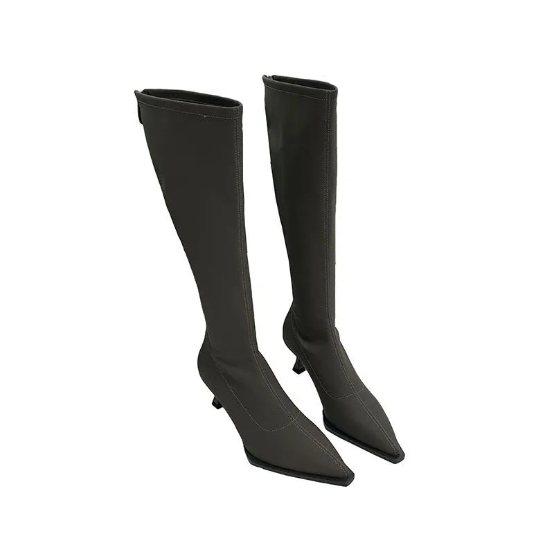 Black pointed toe women's below knee boots with stiletto heel and back zipper.