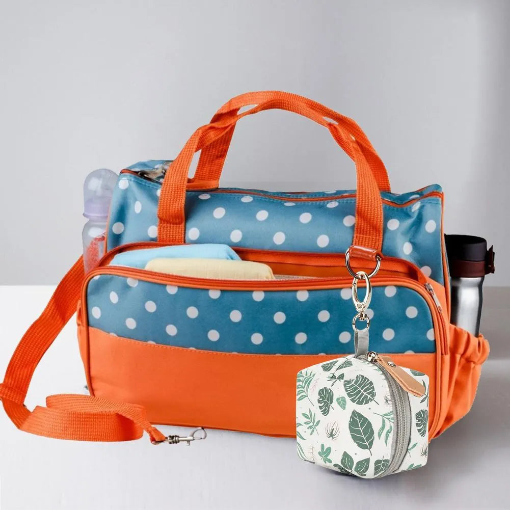 Baby pacifier holder case with PU leather outer and nylon lining, 10cm diameter, holds 2 pacifiers