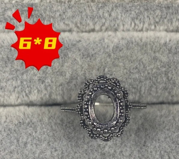 Oval copper open mouth ring with five-pointed star design for 6x8mm stone.