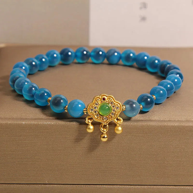 Blue sugar heart agate safety lock pendant bracelet for women with crystal construction and rhinestone detailing