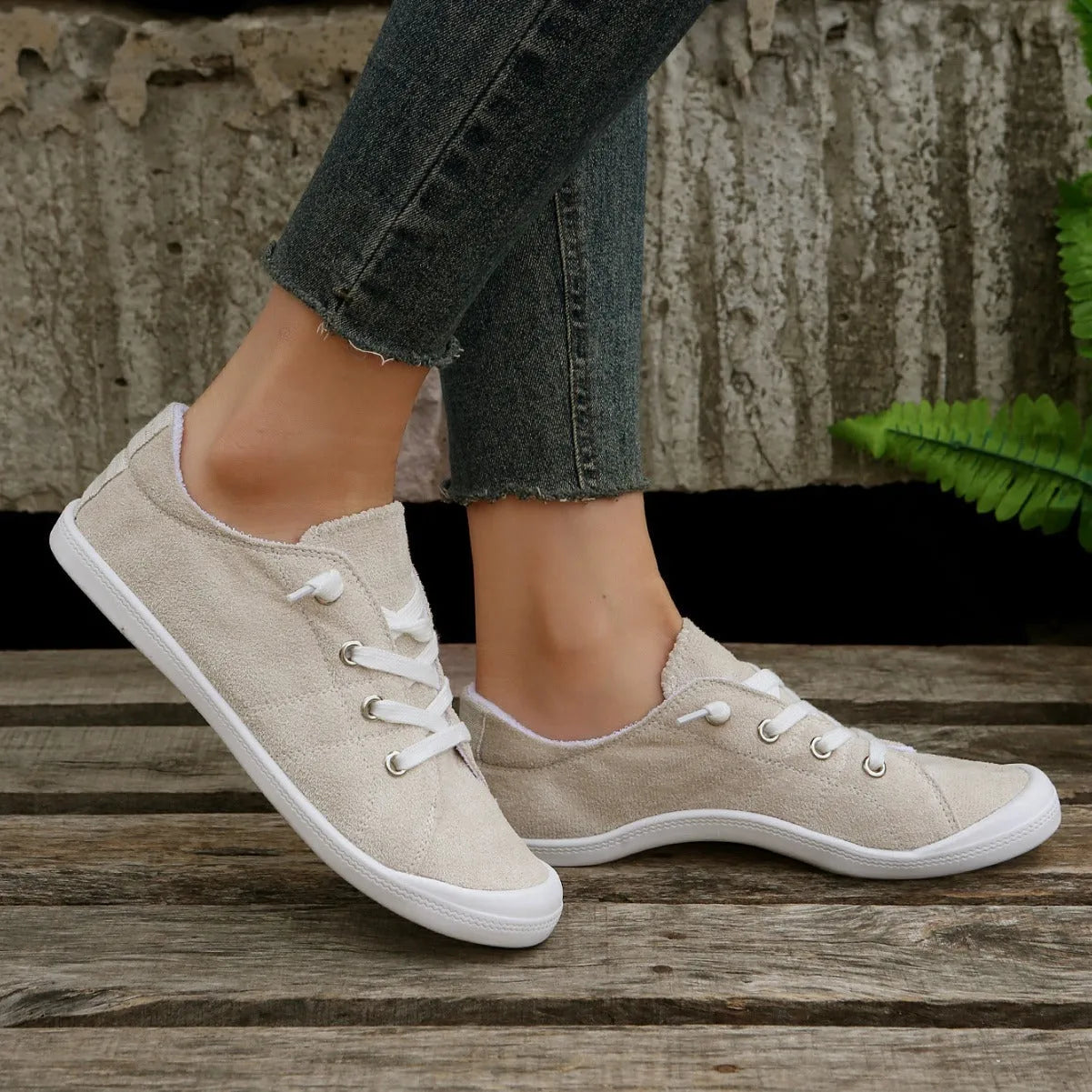 Women's creamy white casual sneakers with fabric upper and rubber sole