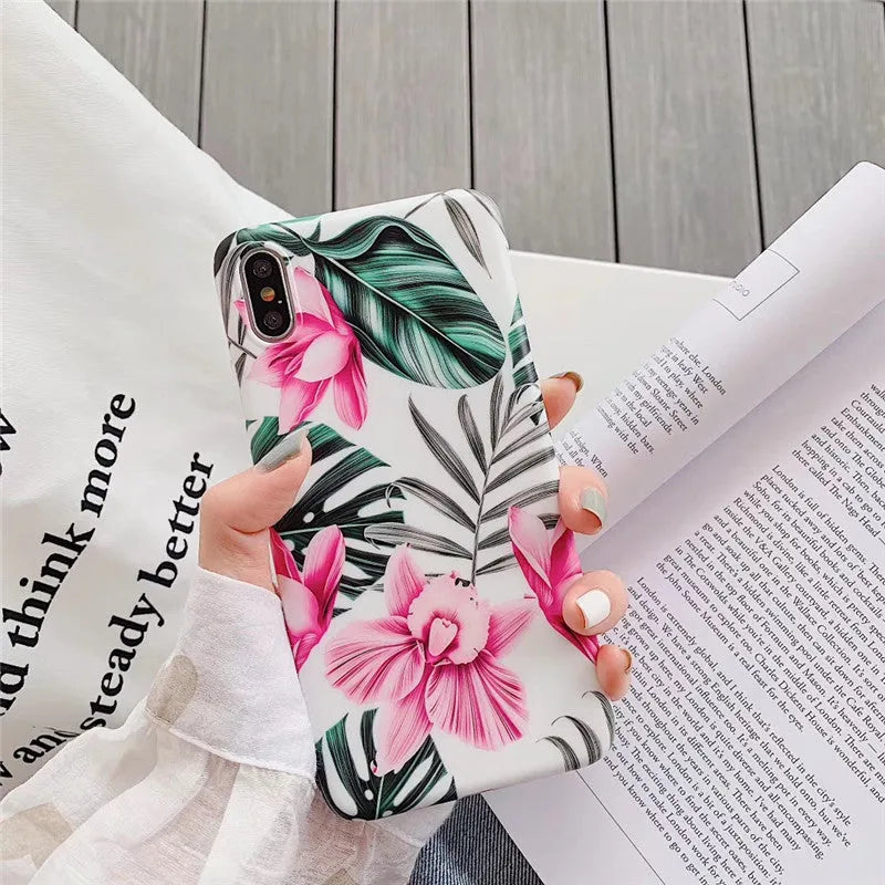 Pink floral pattern TPU phone case for iPhone models on white background