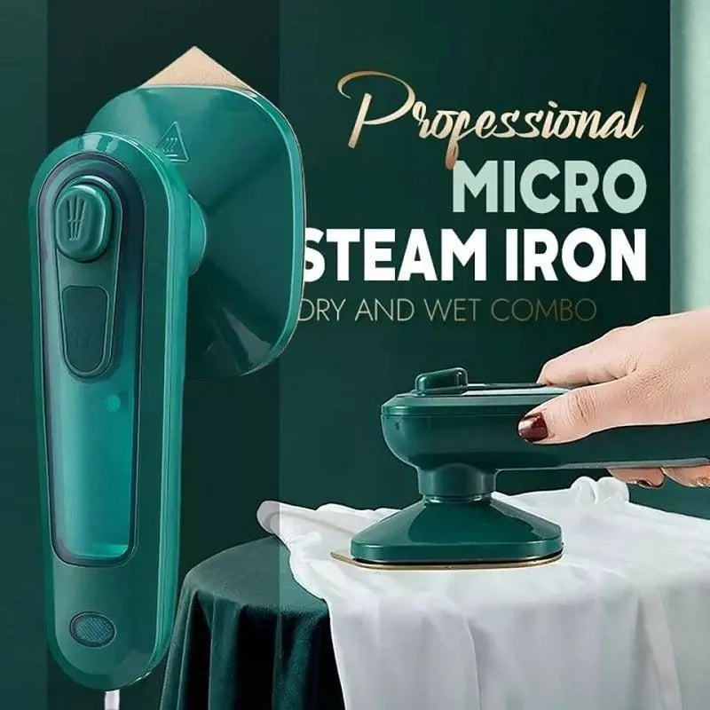 Dark green handheld garment ironing machine with titanium panel and mini steam design for travel and home use.