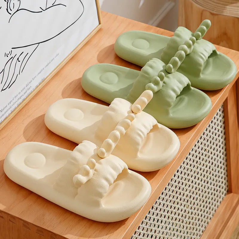 Deer horn design EVA flip-flop slippers in light yellow on a non-slip sole.