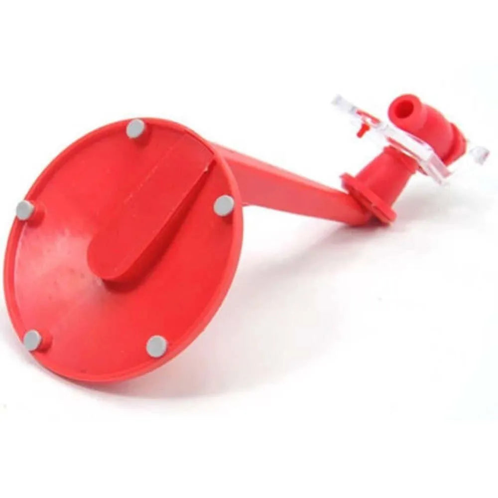 Red plastic soda dispenser attached to 2-litre bottle showing push-button mechanism