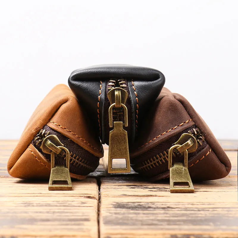 Men's leather clutch coin purse in first layer cowhide with chain, shown in brown yellow, dark brown or black