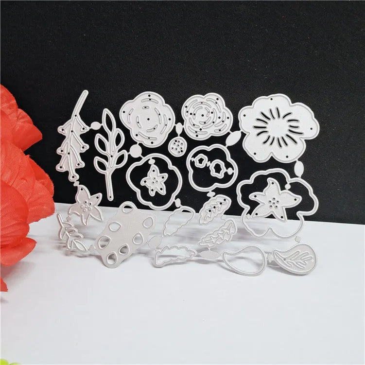 Silver carbon steel flower cutting die for paper crafts measuring 14.3 by 9.9 centimetres