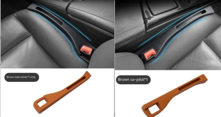 Black plastic car seat gap storage organiser box with a handle, shown inserted between vehicle seats.