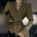 Women's French-style shirt with irregular collar, bell sleeves, and tied front in polyester fabric