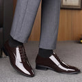 Men's black and brown formal business shoes with a pointed toe made from artificial PU leather.