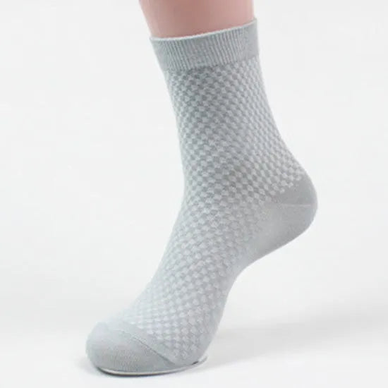 Men's bamboo fibre socks showing small square pattern in black colour with size scale