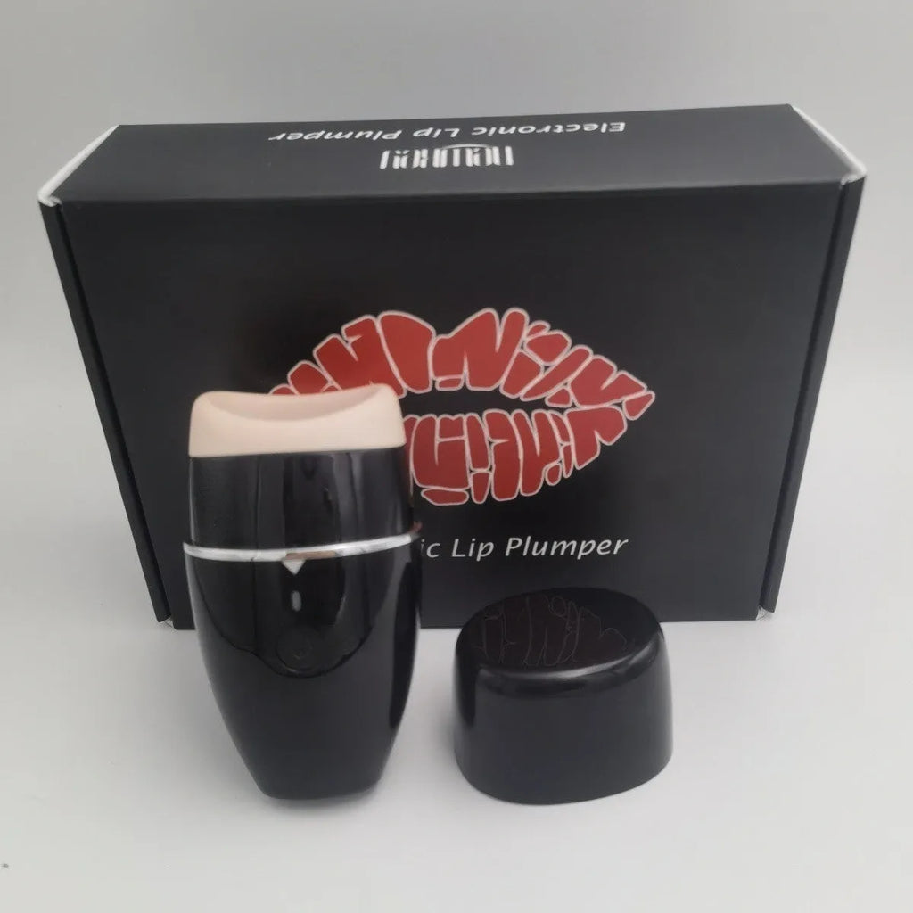 Black and white electric silicone lip plumper device with USB charging cable.