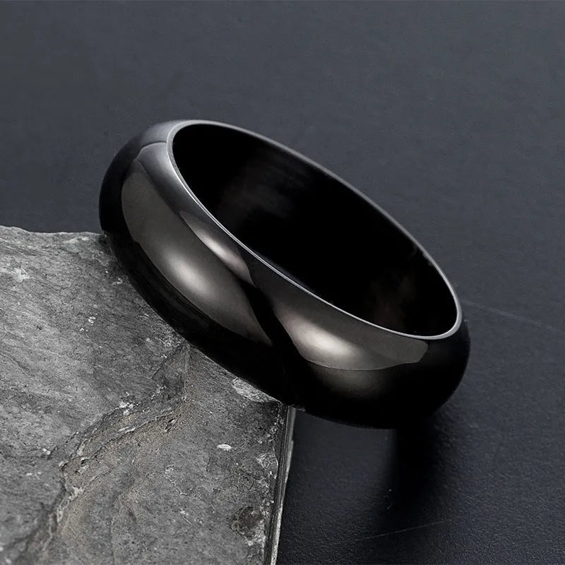Glossy electroplated titanium steel ring shown in gold, black, and steel colour options.