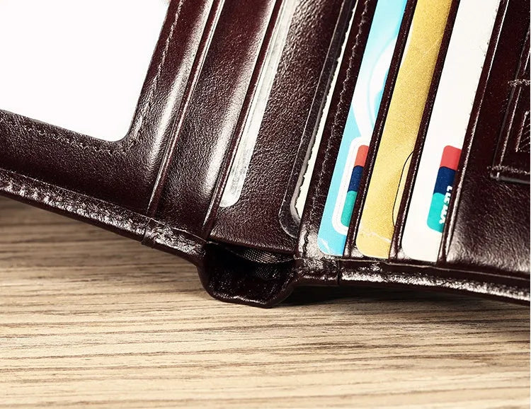 Men's leather wallet showing multiple internal compartments including photo position, card slots and banknote folder