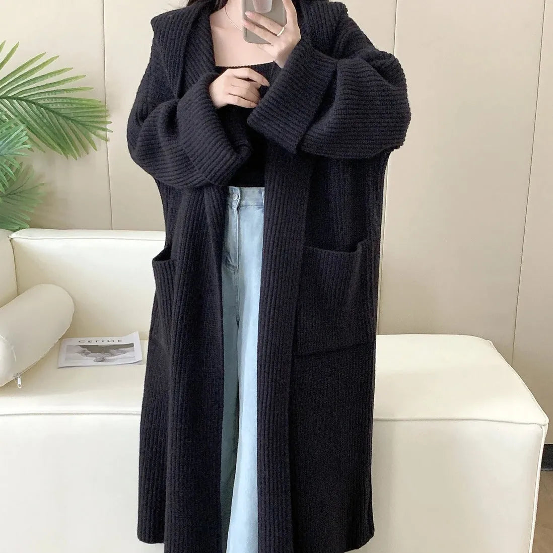 Loose hooded sweatshirt cardigan coat in acrylic fibre with raglan sleeves and extended length