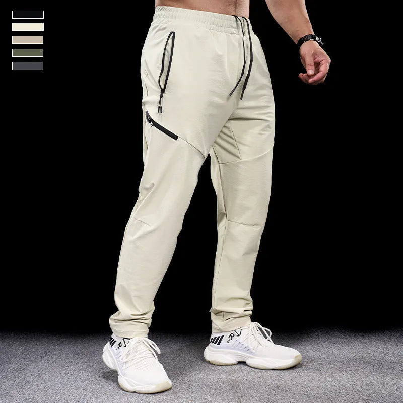 Men's waterproof quick-drying nylon exercise trousers in Army Green colour with mid waist design
