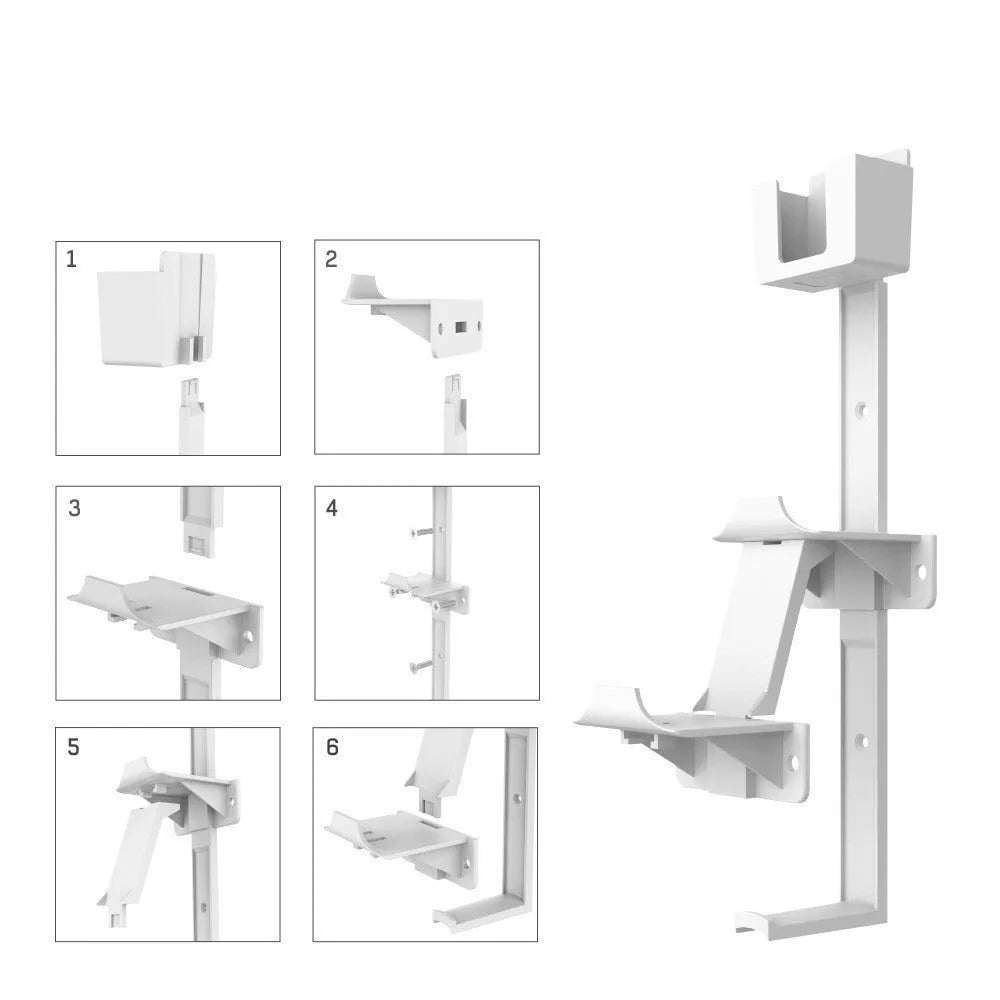 White wall-mounted plastic hook holding a game controller and a TV remote control.