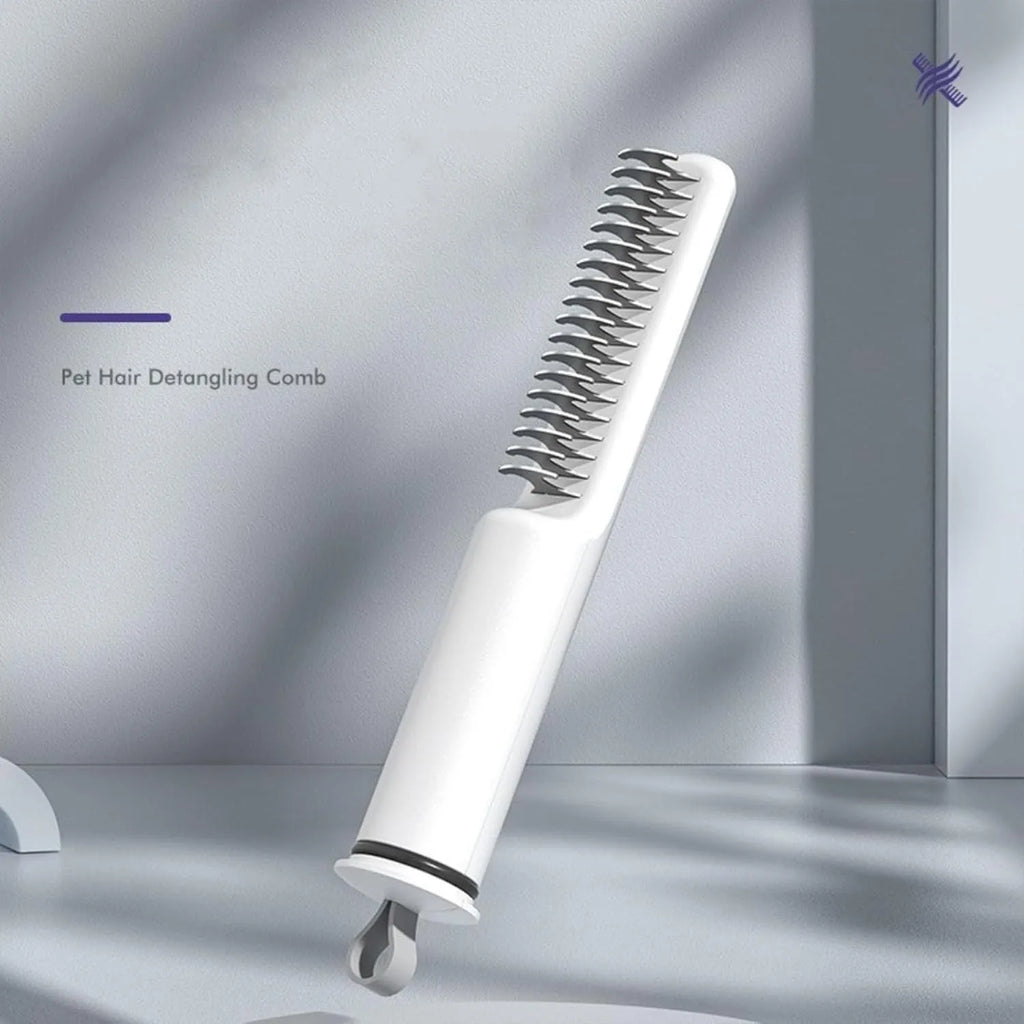 Stainless steel pet dematting comb with ergonomic handle in pink colour.