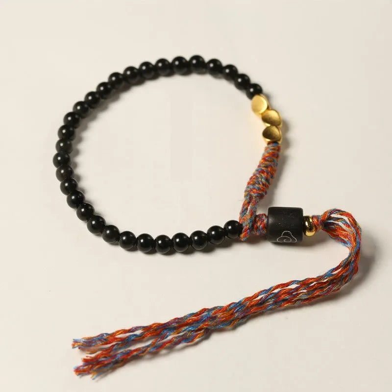Hand-woven obsidian colour bracelet with 4mm width and 15.5-16cm length shown as wearable accessory