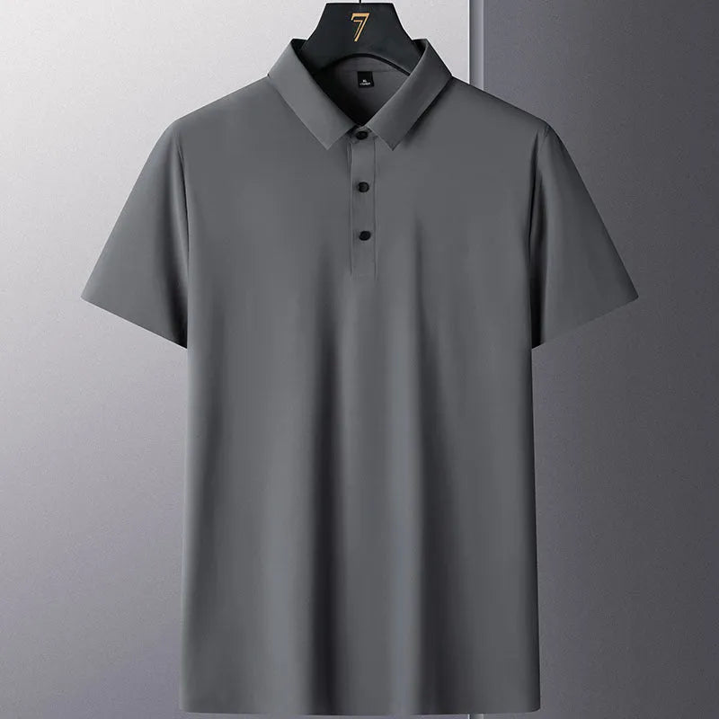 Man wearing a solid colour short sleeve non-iron business casual shirt in a professional setting.