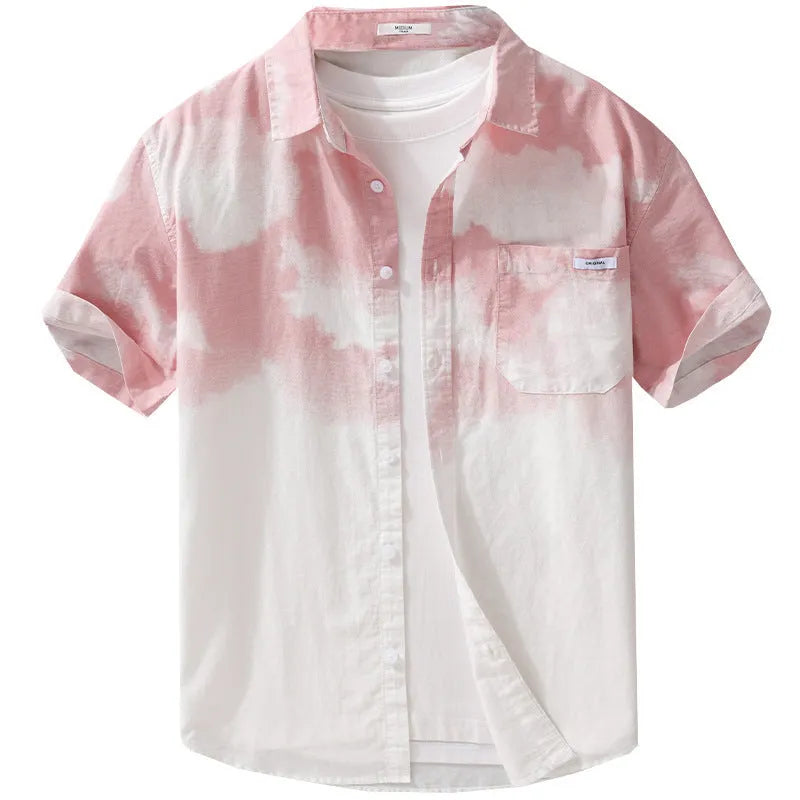 Man wearing a light pink loose-fitting pure cotton short-sleeved cardigan-style shirt.