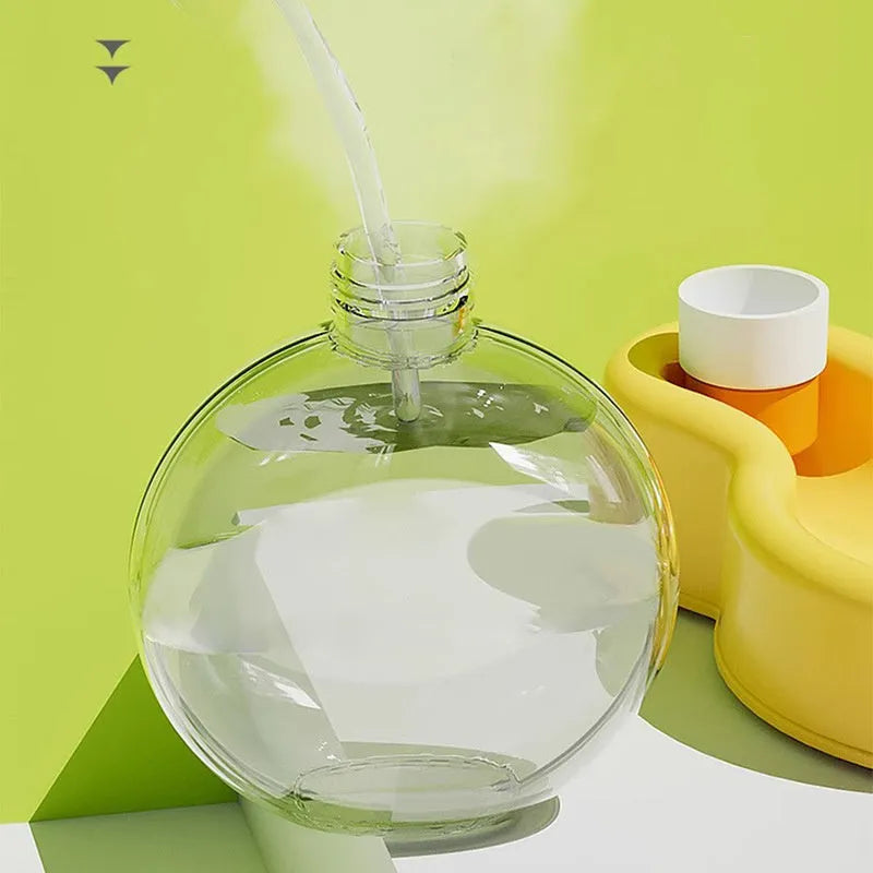 Green portable dog water bottle with pull-out drinking bowl for travel and outdoor use