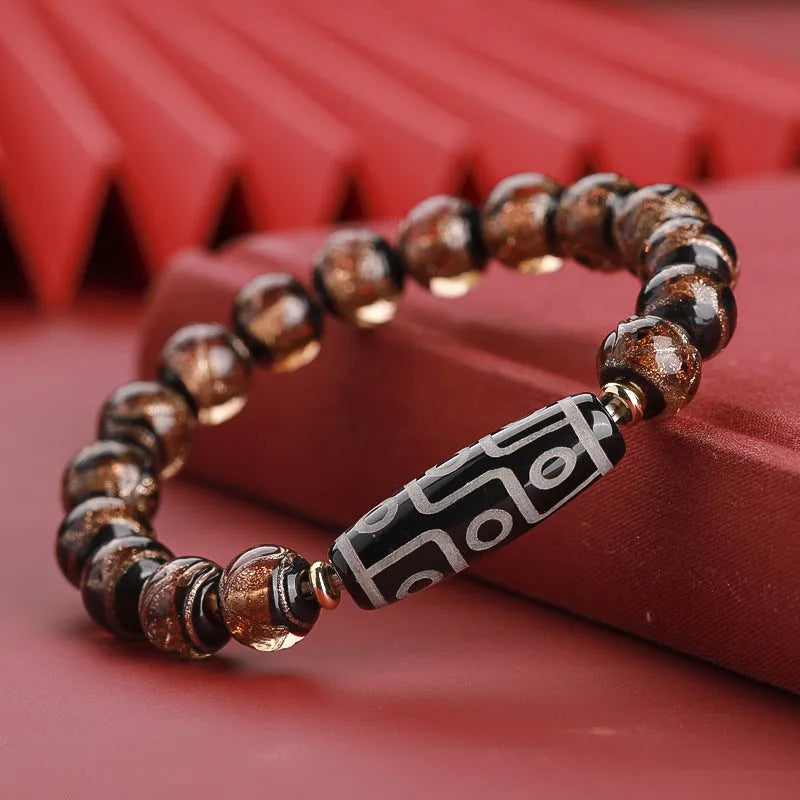 Traditional Chinese coloured glaze bracelet with year snake and lucky bead elements in ancient five-colour design