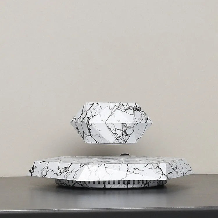 Magnetic levitating plant pot floating in mid-air with marbling colour design