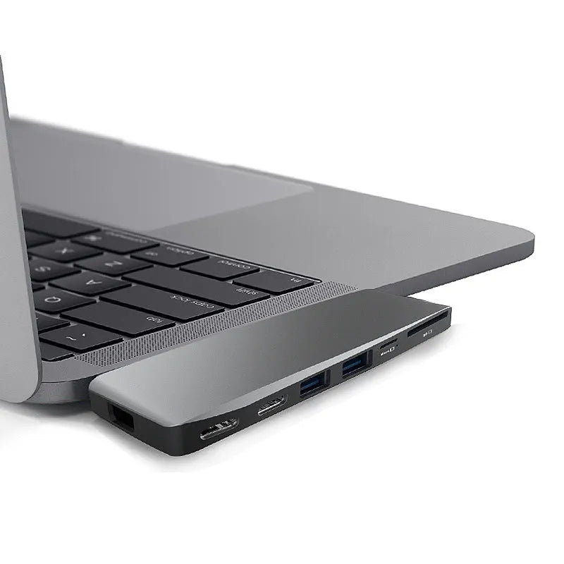 USB-C hub adapter for MacBook Pro with eight interfaces including USB ports and card readers